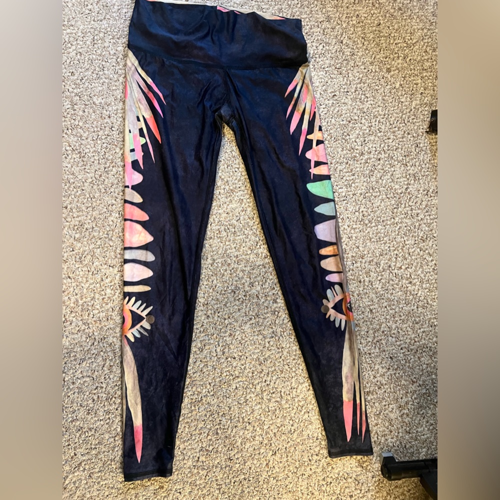 Teeki yoga leggings size Medium. Small hole next to seam, imperfection not wear